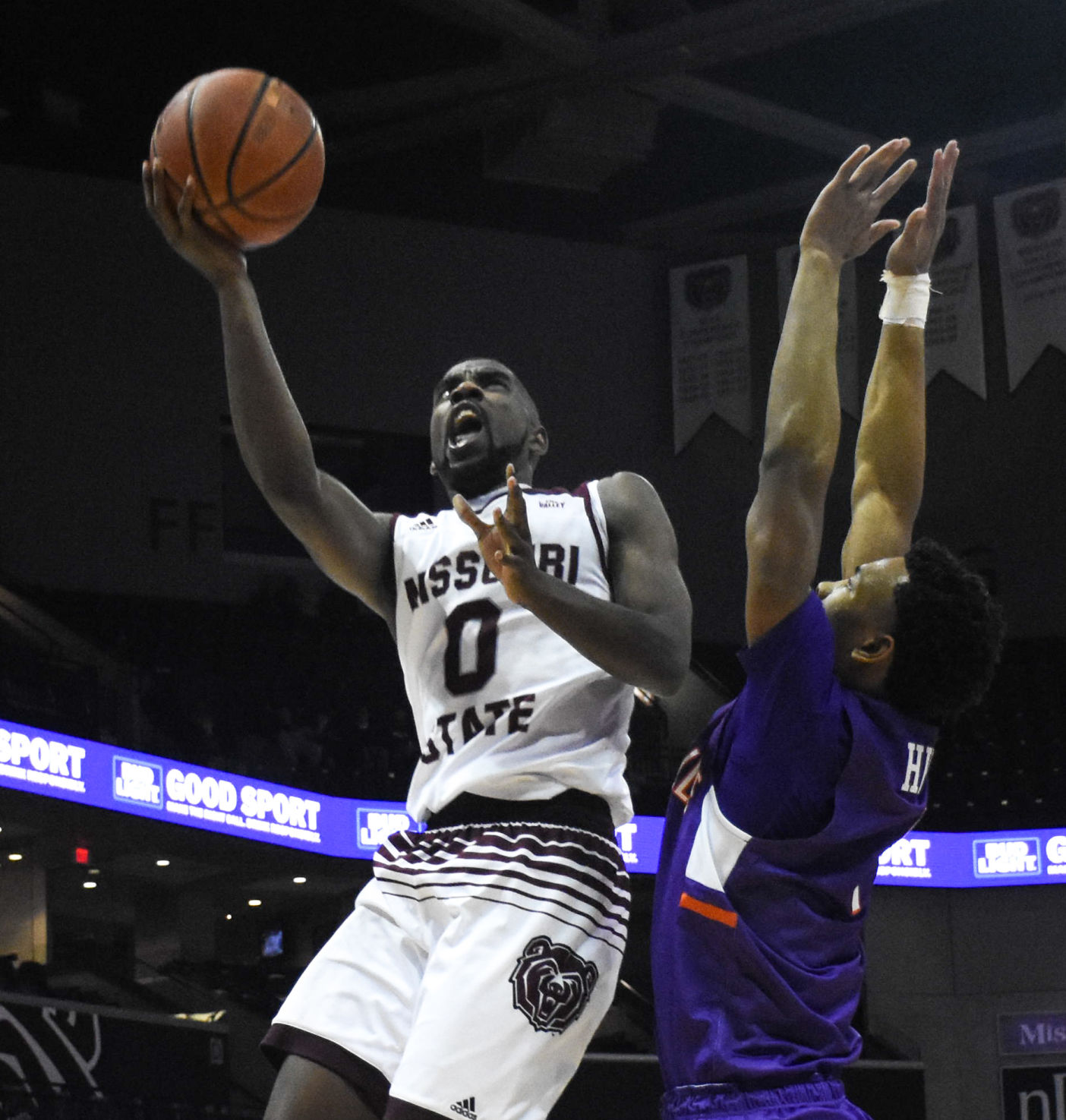 Josh Webster shoots a layup